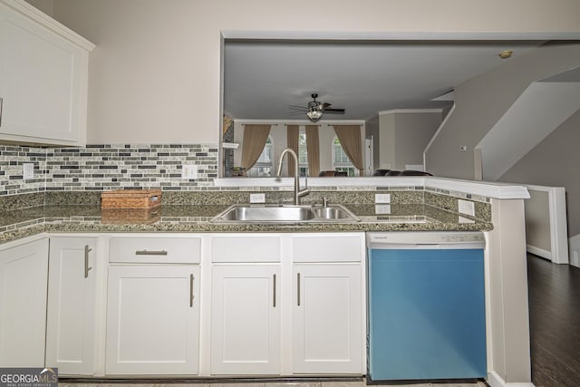 3343 Lathenview Ct, Milton, GA 30004 - kitchen featuring dishwasher, a ceiling fan, white cabinetry, a peninsula, and tasteful backsplash