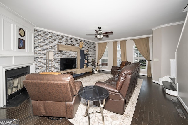 3343 Lathenview Ct, Milton, GA 30004 - living room featuring a fireplace, a ceiling fan, dark wood finished floors, crown molding, and brick wall
