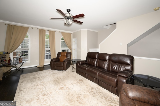 3343 Lathenview Ct, Milton, GA 30004 - living area featuring ceiling fan, wood finished floors, crown molding, and stairs