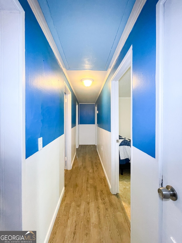 1191 Zoar Rd, Baxley, GA 31513 - corridor with wood finished floors and crown molding