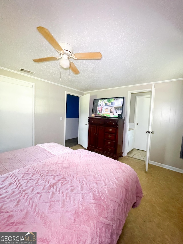 1191 Zoar Rd, Baxley, GA 31513 - bedroom featuring ceiling fan, crown molding, and a textured ceiling