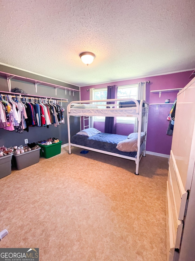 1191 Zoar Rd, Baxley, GA 31513 - bedroom with a textured ceiling and carpet