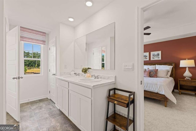 1404 Gray Branch Dr, Lawrenceville, GA 30045 - bathroom with double vanity, ensuite bathroom, and baseboards