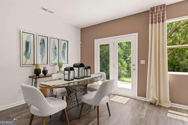 1404 Gray Branch Dr, Lawrenceville, GA 30045 - dining area with wood finished floors and baseboards