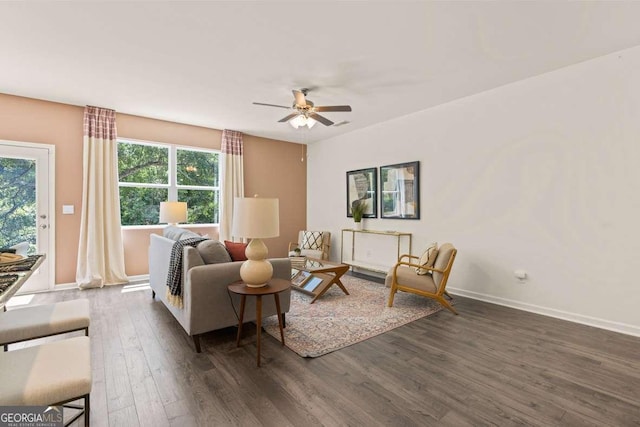 1404 Gray Branch Dr, Lawrenceville, GA 30045 - living room featuring wood finished floors, a ceiling fan, and baseboards