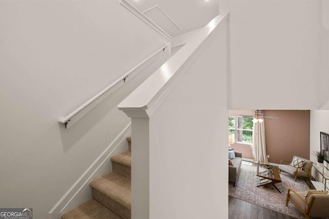1404 Gray Branch Dr, Lawrenceville, GA 30045 - stairway featuring wood finished floors