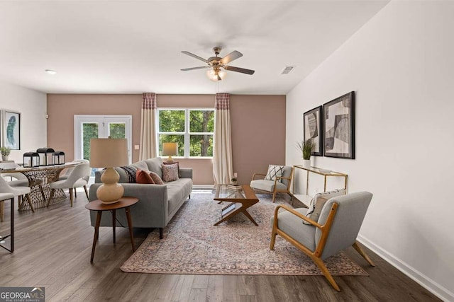 1404 Gray Branch Dr, Lawrenceville, GA 30045 - living area featuring ceiling fan, wood finished floors, and baseboards