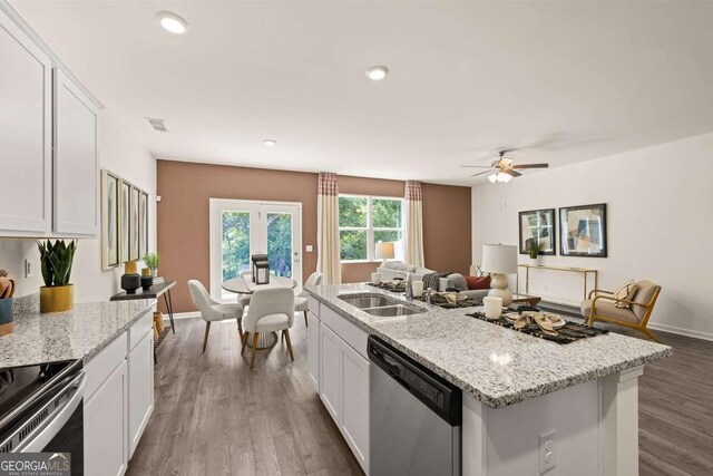 1404 Gray Branch Dr, Lawrenceville, GA 30045 - kitchen featuring appliances with stainless steel finishes, a sink, white cabinets, and recessed lighting