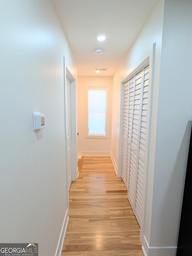 123 Dahlgren St SE, Atlanta, GA 30317 - hall with light wood-style floors and baseboards