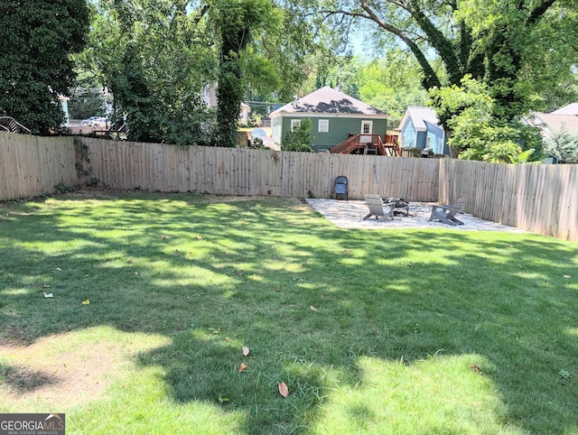 123 Dahlgren St SE, Atlanta, GA 30317 - view of yard featuring an outdoor fire pit and a patio area