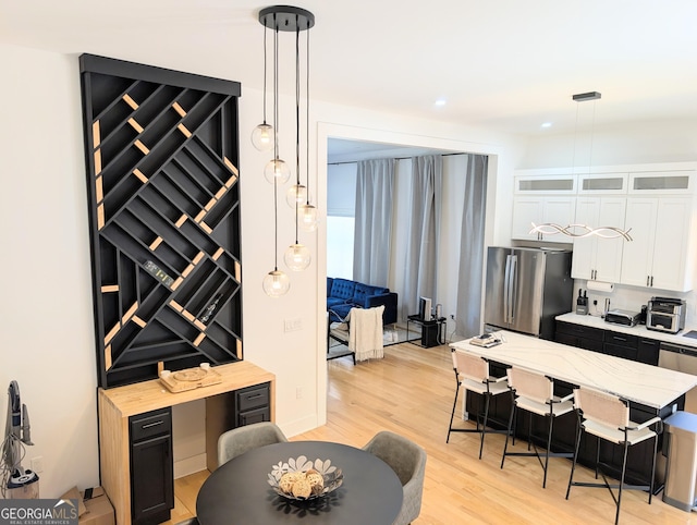 123 Dahlgren St SE, Atlanta, GA 30317 - dining room featuring light wood-type flooring and recessed lighting