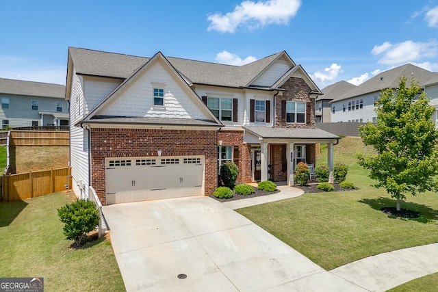 4306 Applebrook Ter, Gainesville, GA 30504 - view of front facade with concrete driveway, a porch, brick siding, and a shingled roof