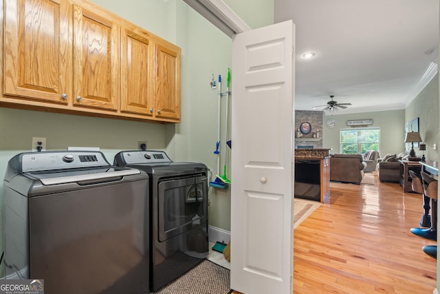 1724 Watercrest Way # G, Young Harris, GA 30582 - washroom with cabinet space, washer and clothes dryer, ornamental molding, ceiling fan, and light wood-style floors