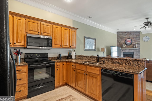 1724 Watercrest Way # G, Young Harris, GA 30582 - kitchen with black appliances, a sink, ornamental molding, a peninsula, and open floor plan