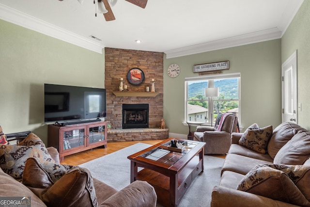 1724 Watercrest Way # G, Young Harris, GA 30582 - living room with ceiling fan, crown molding, wood finished floors, and a fireplace