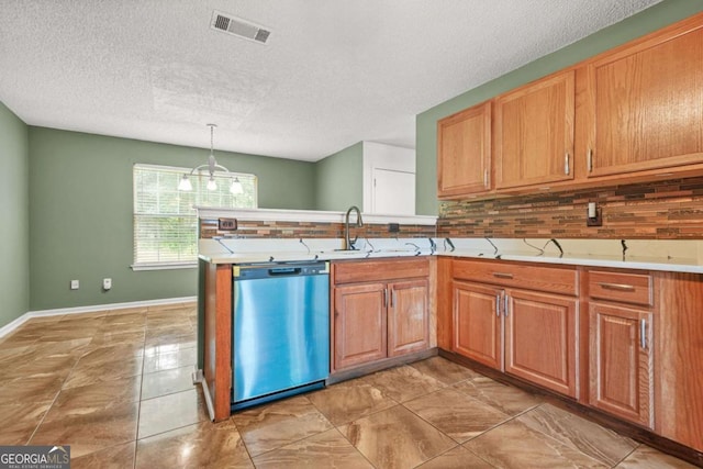 6799 Hill Creek Cv, Lithonia, GA 30058 - kitchen with dishwasher, backsplash, a sink, a textured ceiling, and a peninsula