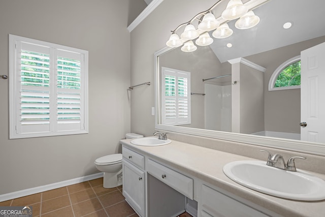 105 Paces Landing Trl, Newnan, GA 30263 - bathroom featuring toilet, baseboards, double vanity, tile patterned floors, and a shower