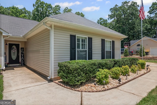 105 Paces Landing Trl, Newnan, GA 30263 - doorway to property featuring roof with shingles