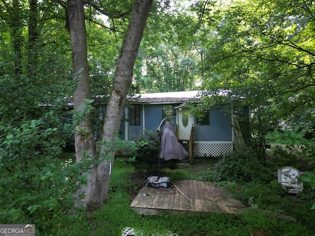 243 Lakeside Trl, Martin, GA 30557 - back of property with a wooden deck