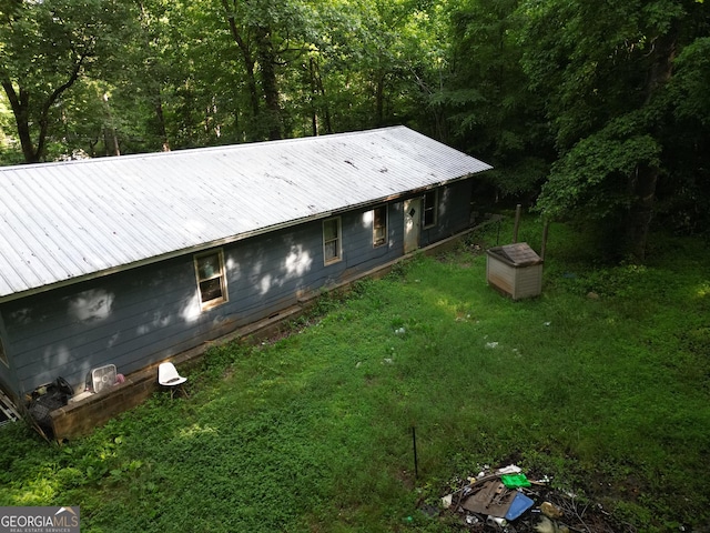243 Lakeside Trl, Martin, GA 30557 - view of side of property featuring metal roof, a lawn, and a forest view