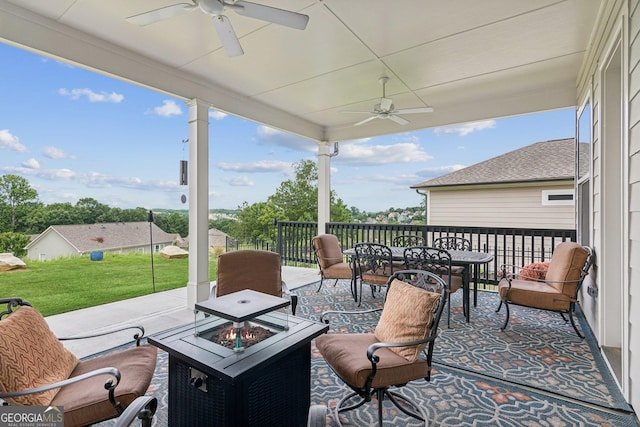 6937 River Rock Dr, Flowery Branch, GA 30542 - view of patio with a ceiling fan, an outdoor fire pit, and outdoor dining area