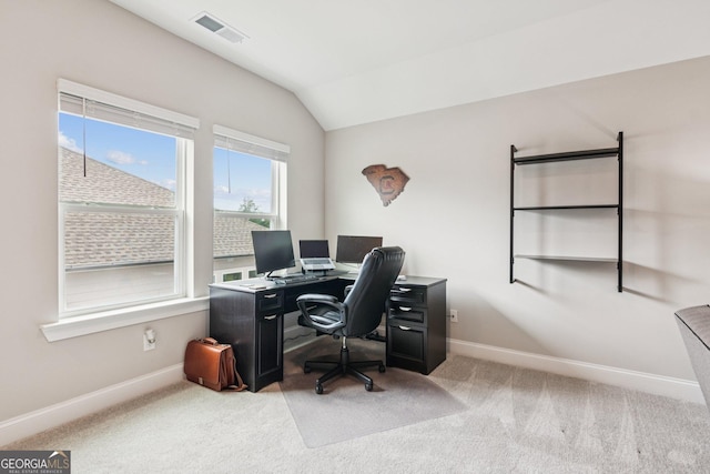 6937 River Rock Dr, Flowery Branch, GA 30542 - carpeted home office featuring vaulted ceiling and baseboards