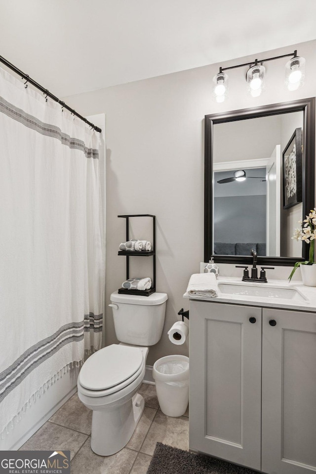 6937 River Rock Dr, Flowery Branch, GA 30542 - full bath with vanity, tile patterned floors, and a shower with shower curtain