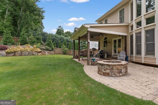 412 Mill Stream Way, Woodstock, GA 30188 - view of yard with an outdoor fire pit, ceiling fan, a patio area, and french doors