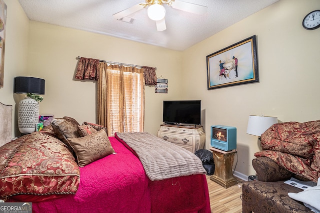 2928 Mandy Ct, Jonesboro, GA 30236 - bedroom featuring wood finished floors, ceiling fan, and baseboards