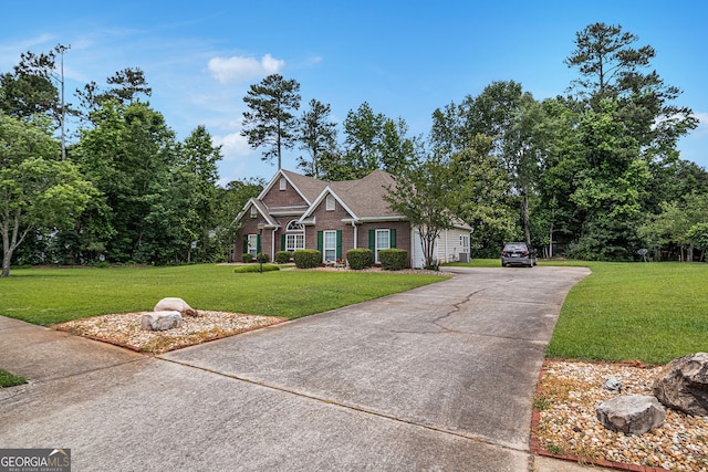 2928 Mandy Ct, Jonesboro, GA 30236 - view of front of property featuring a front lawn, driveway, and brick siding