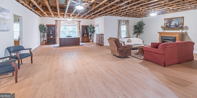 370 Grand Teton Cir, Fayetteville, GA 30215 - living room with a ceiling fan, a fireplace, light wood finished floors, and plenty of natural light