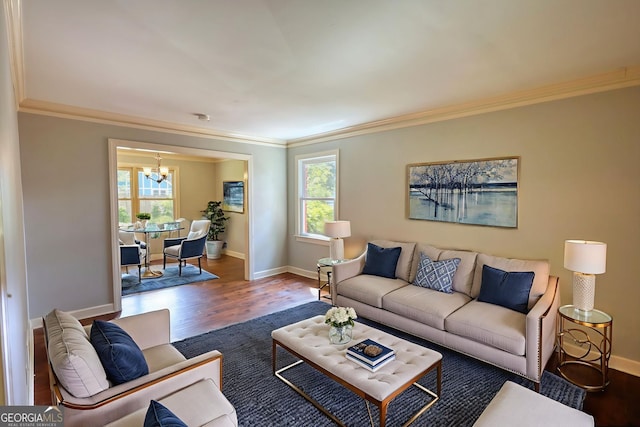 1177 Castle Way, Norcross, GA 30093 - living area with a chandelier, ornamental molding, plenty of natural light, wood finished floors, and baseboards