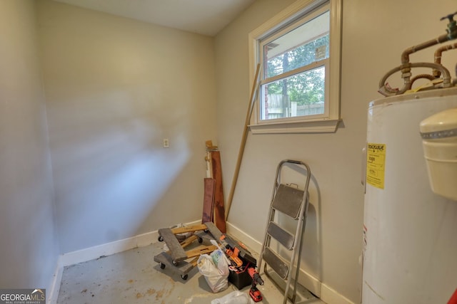 1177 Castle Way, Norcross, GA 30093 - bathroom featuring water heater, baseboards, and concrete flooring