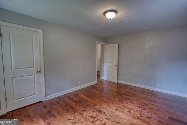 1177 Castle Way, Norcross, GA 30093 - empty room with wood finished floors and baseboards