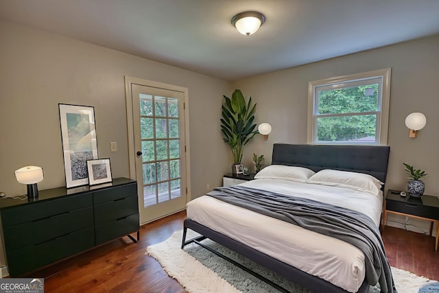1177 Castle Way, Norcross, GA 30093 - bedroom with access to outside and dark wood-type flooring
