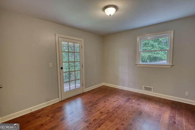 1177 Castle Way, Norcross, GA 30093 - unfurnished room with dark wood finished floors and baseboards