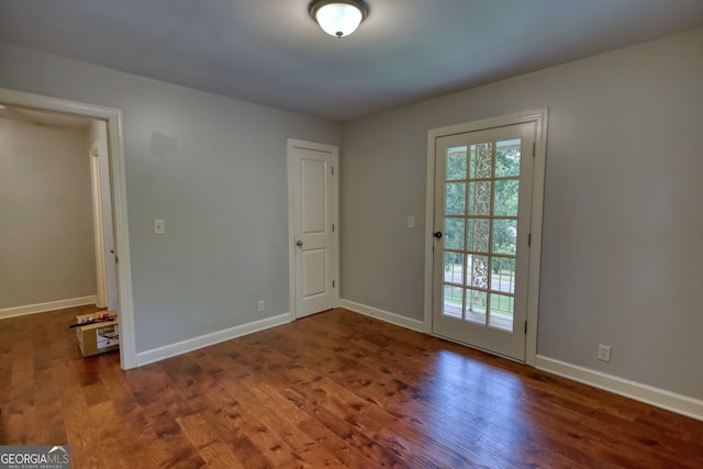 1177 Castle Way, Norcross, GA 30093 - spare room featuring plenty of natural light, wood finished floors, and baseboards