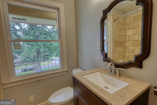 1177 Castle Way, Norcross, GA 30093 - bathroom featuring toilet, vanity, and a shower
