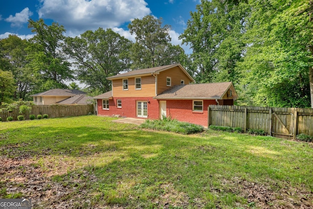 1177 Castle Way, Norcross, GA 30093 - back of property featuring brick siding, french doors, and a patio area