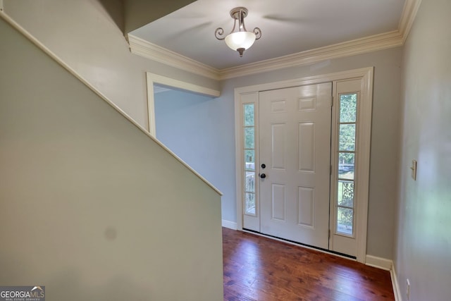 1177 Castle Way, Norcross, GA 30093 - foyer entrance with dark wood-style floors, ornamental molding, and baseboards
