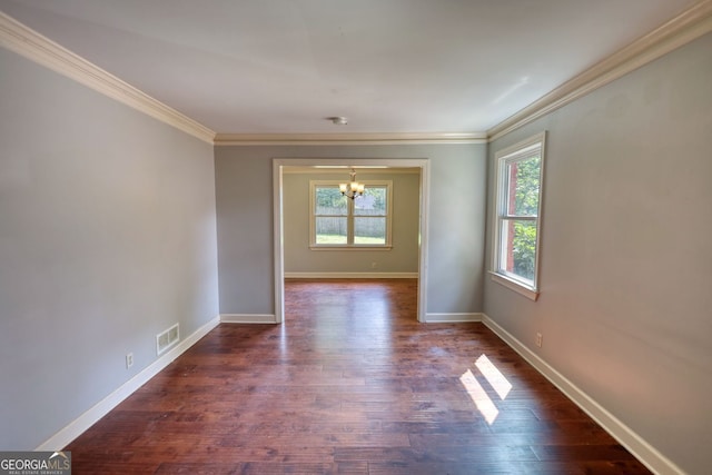 1177 Castle Way, Norcross, GA 30093 - spare room featuring a chandelier, crown molding, dark wood-style flooring, and baseboards