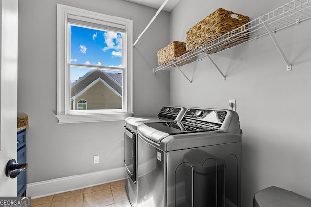 55 Jolie Ln, Sharpsburg, GA 30277 - laundry area with washer and dryer and tile patterned floors