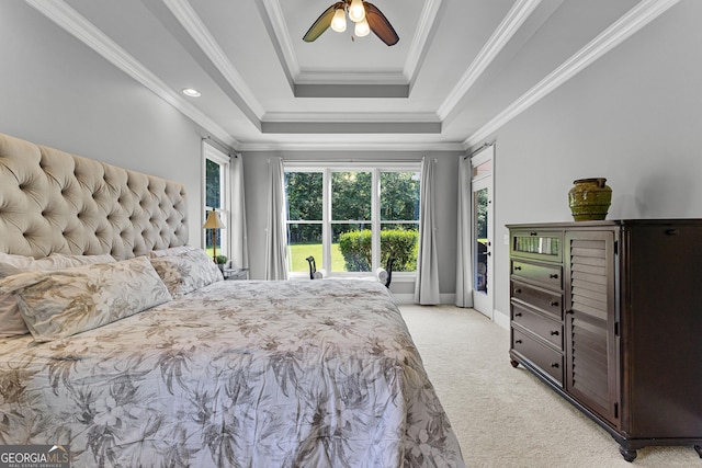 55 Jolie Ln, Sharpsburg, GA 30277 - bedroom with light colored carpet, a raised ceiling, crown molding, a ceiling fan, and access to exterior