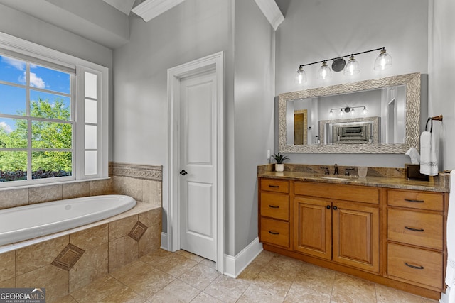 55 Jolie Ln, Sharpsburg, GA 30277 - bathroom featuring vanity, a garden tub, and tile patterned flooring