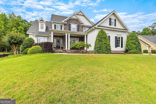 55 Jolie Ln, Sharpsburg, GA 30277 - craftsman-style house featuring a front yard and covered porch