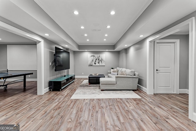 55 Jolie Ln, Sharpsburg, GA 30277 - living room featuring crown molding, wood finished floors, recessed lighting, and a tray ceiling