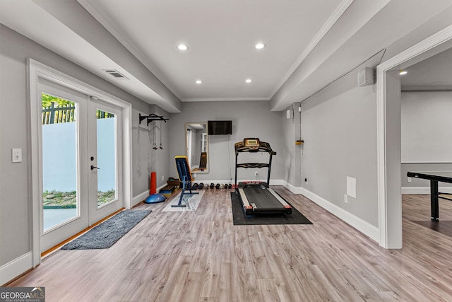 55 Jolie Ln, Sharpsburg, GA 30277 - exercise room featuring french doors, plenty of natural light, recessed lighting, ornamental molding, and wood finished floors