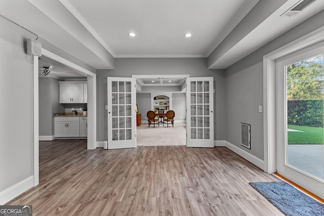 55 Jolie Ln, Sharpsburg, GA 30277 - unfurnished dining area with french doors, ornamental molding, light wood-style flooring, and recessed lighting