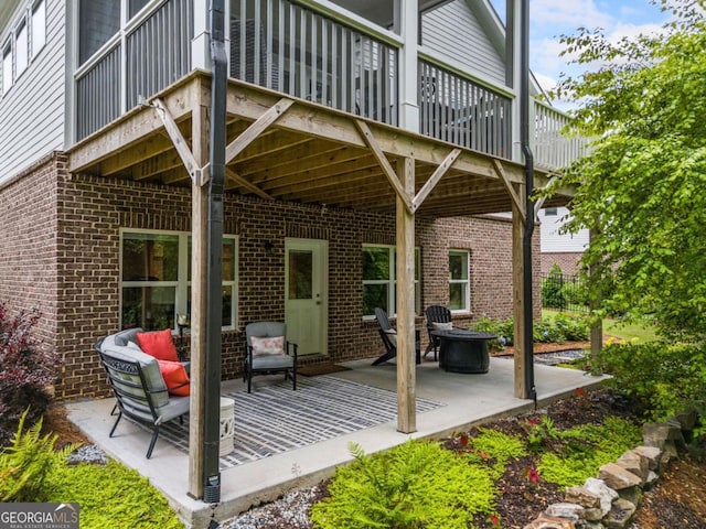 309 Mcdaniel Pl, Canton, GA 30115 - view of patio featuring an outdoor fire pit