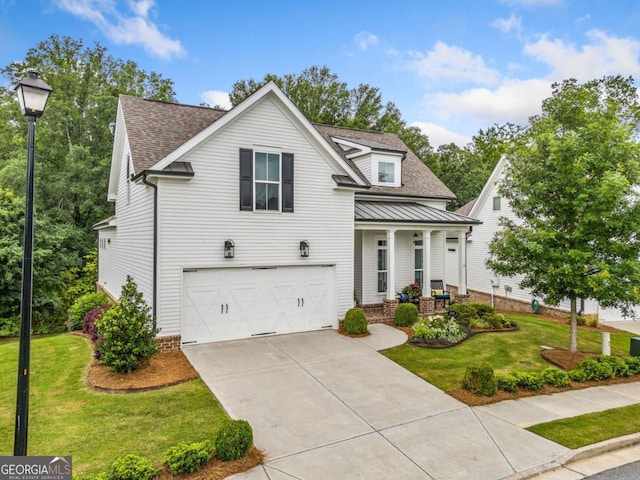 309 Mcdaniel Pl, Canton, GA 30115 - view of front facade featuring a porch, an attached garage, a front yard, driveway, and a shingled roof